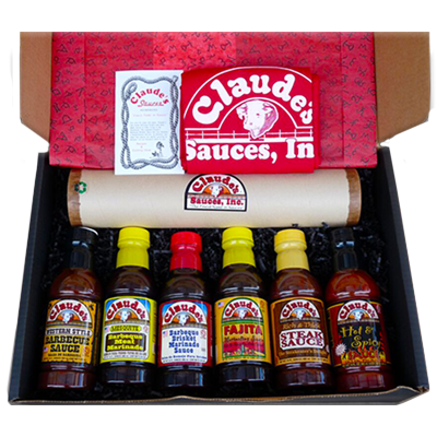 Claude's Sauces Mucho Grande Gift Pack with all 6 top selling marinades, sauces and a Claude's Grilling Utensil set.
