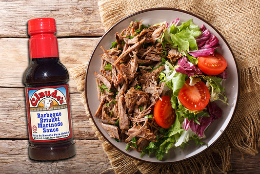 A Beef Brisket Salad and a 16oz bottle of Claude's BBQ Brisket Marinade