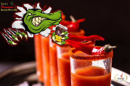 Cartoon alligator holding a 64 oz. bottle of Tanks overtop a row of spicy bloody mary drinks